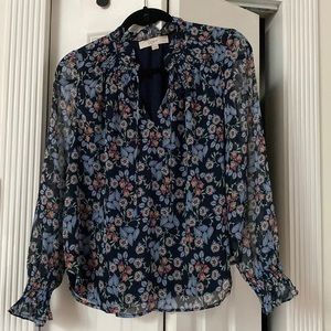 Patterned blue blouse